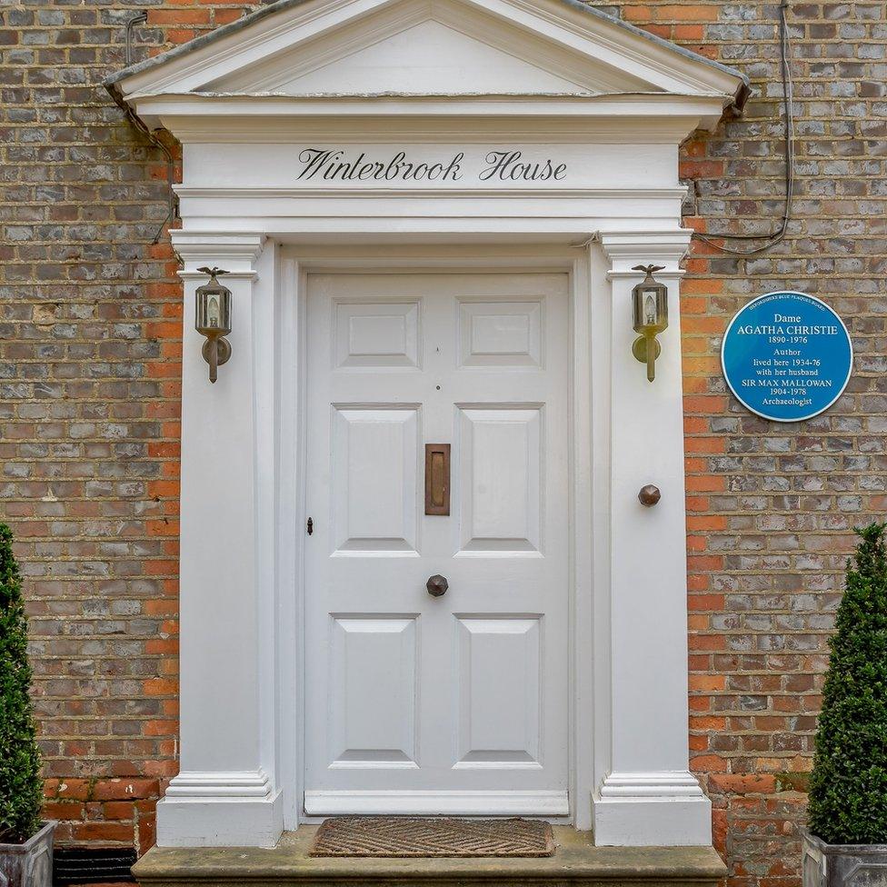 Front door of Agatha Christie house with blue plaque