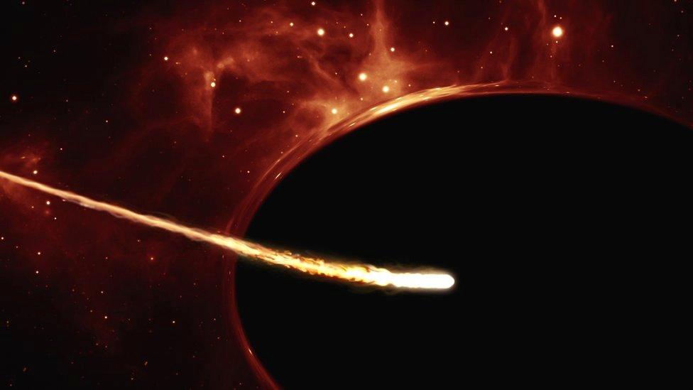 Artist’s impression depicting a Sun-like star close to a rapidly spinning supermassive black hole