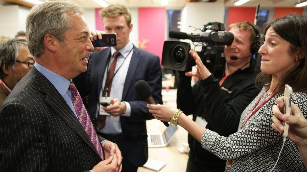 Nigel Farage speaks to the media