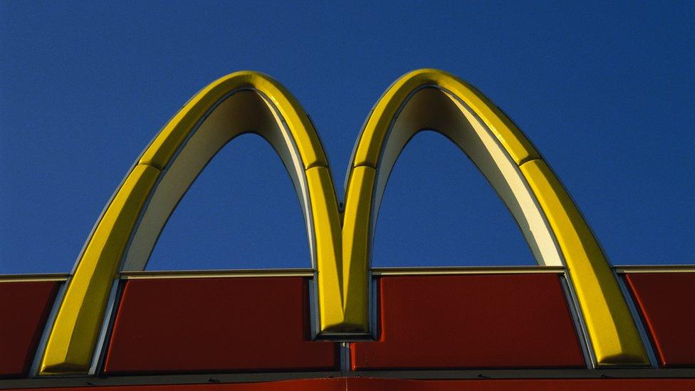 McDonald's famous golden arches sign against the sky