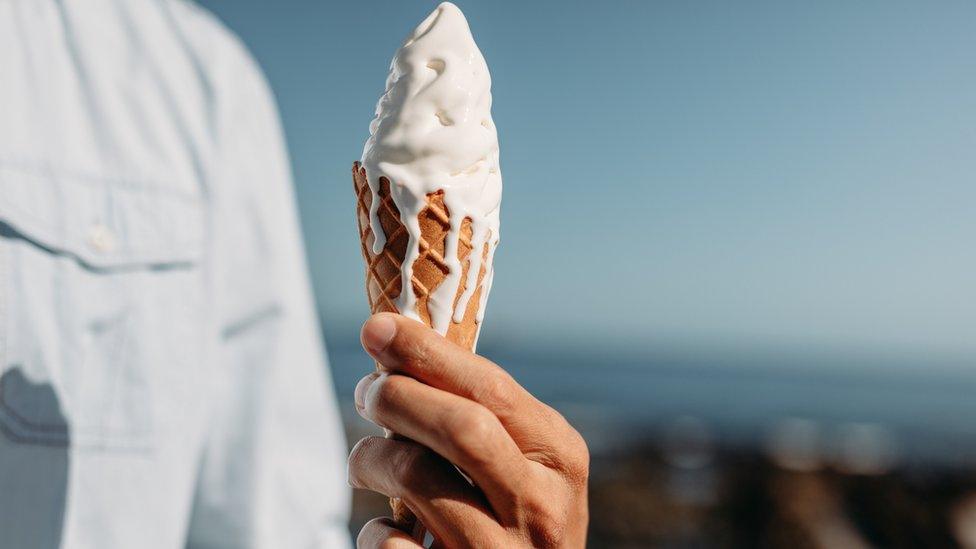 Ice-cream melting in a hand