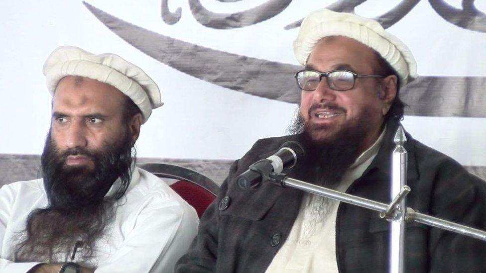 Hafiz Saeed (right) addresses activists in Muzaffarabad 11 January