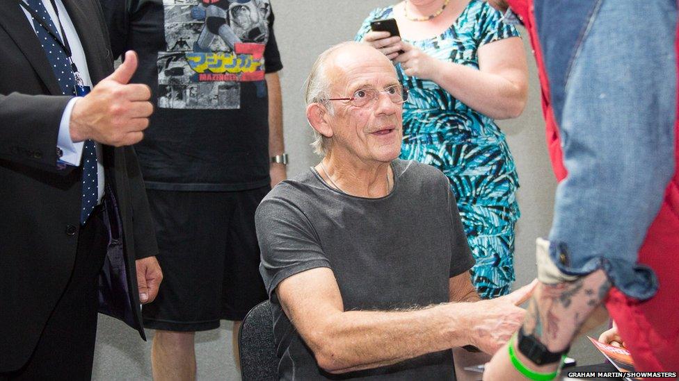 Christopher Lloyd greeting a fan