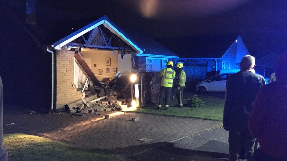 Car smashes into bungalow