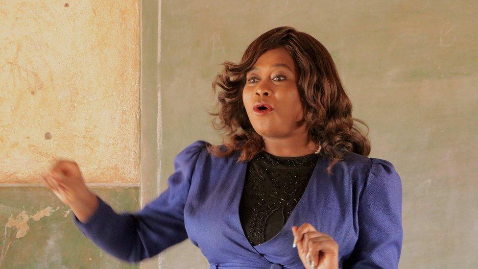 natasha talks to girl children at a public school in the capital lilongwe