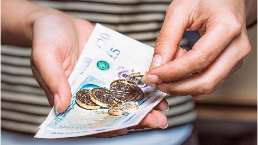 A woman counting money