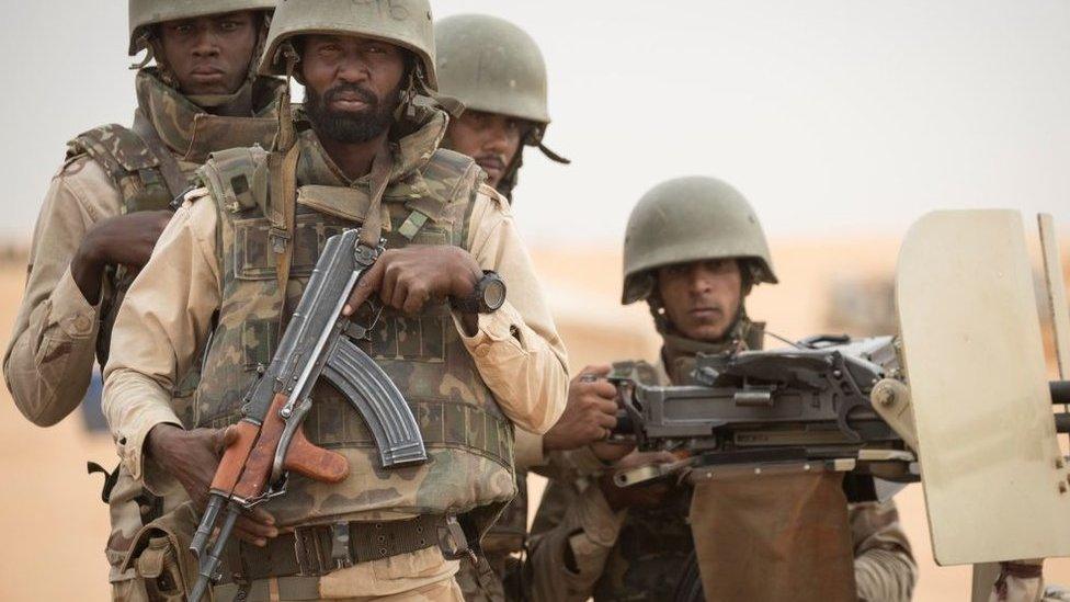 Mauritanian soldiers stand guard at a G5 Sahel task force command post, in November 2018