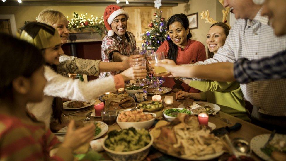 Family enjoying Christmas dinner