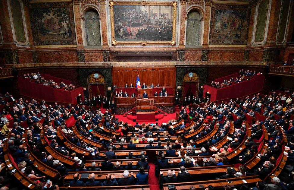 French President Emmanuel Macron (C) speaks during a special congress gathering both houses of parliament (National Assembly and Senate) in the palace of Versailles, outside Paris, on July 3, 2017.