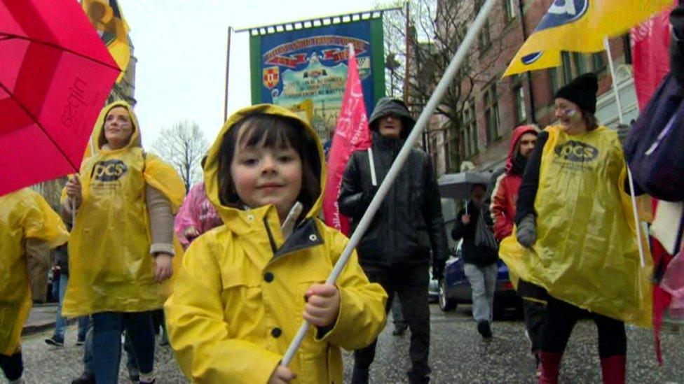 child at women's rally