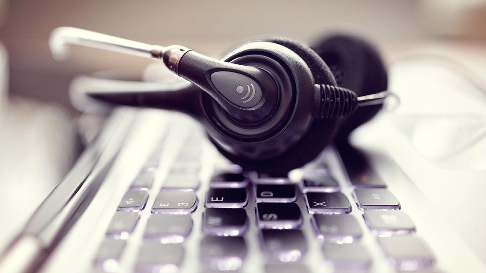 A laptop set up for conference calling