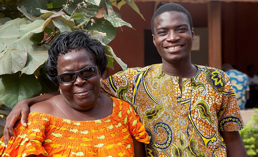 Pelagie Agossou and her grandson, Judikael