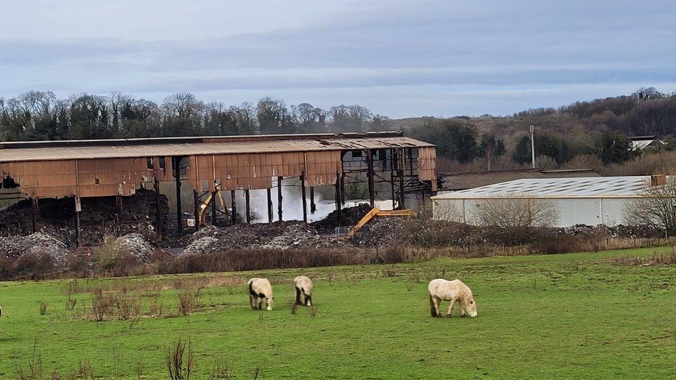 A burning industrial building