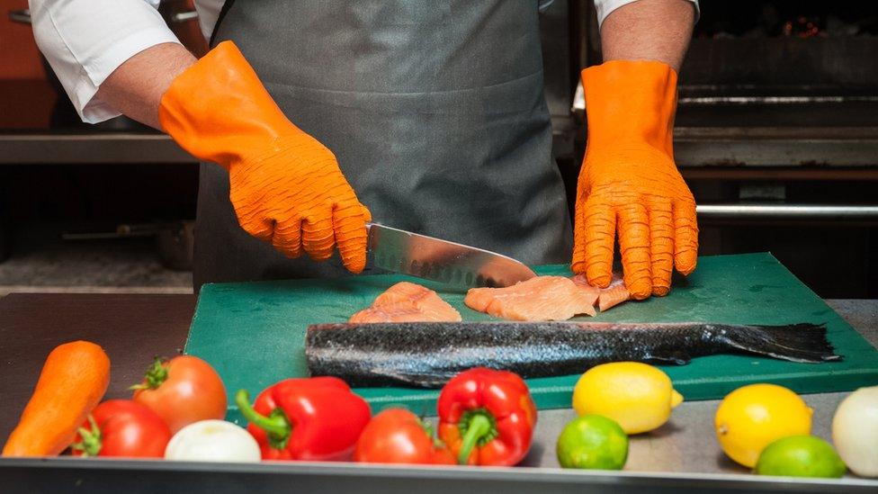 Salmon being prepared