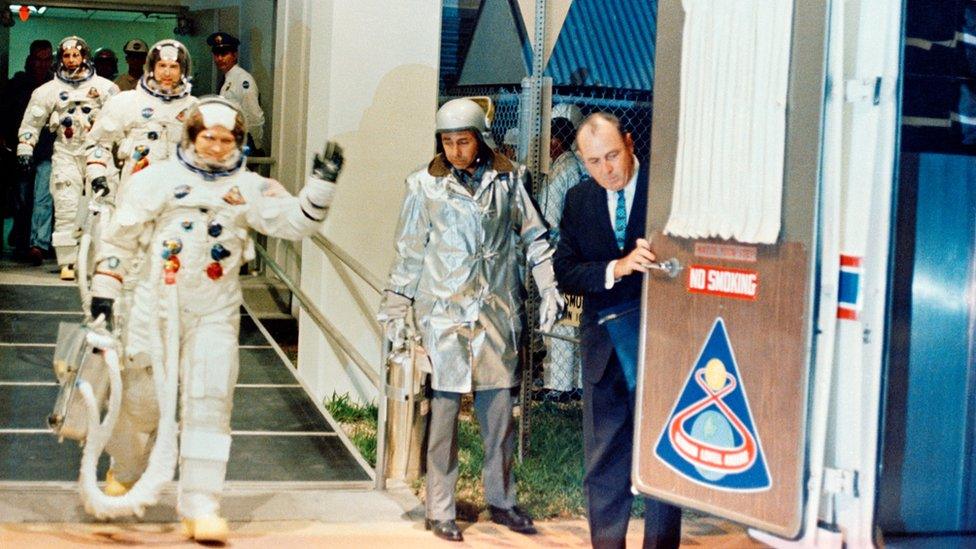 Astronauts walking out