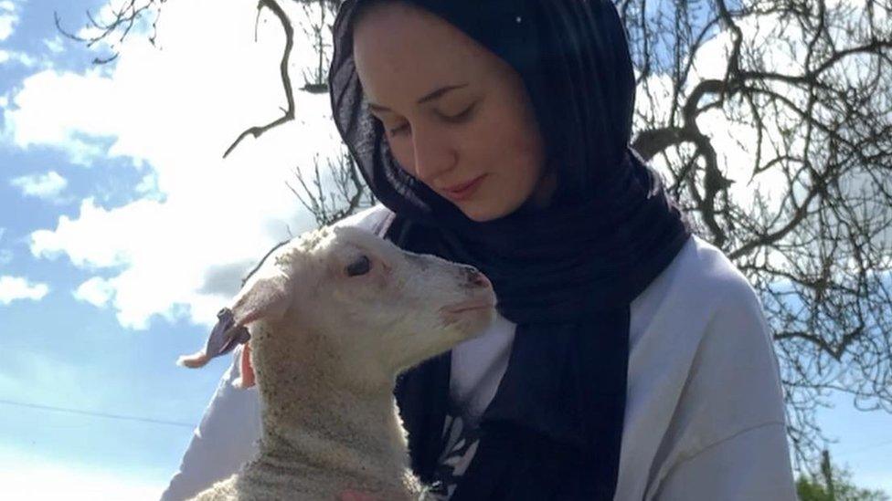 Abby-Leigh holding a sheep