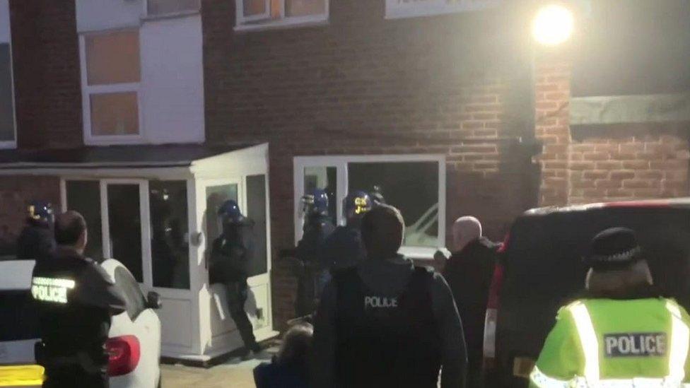 Police officers raid on house