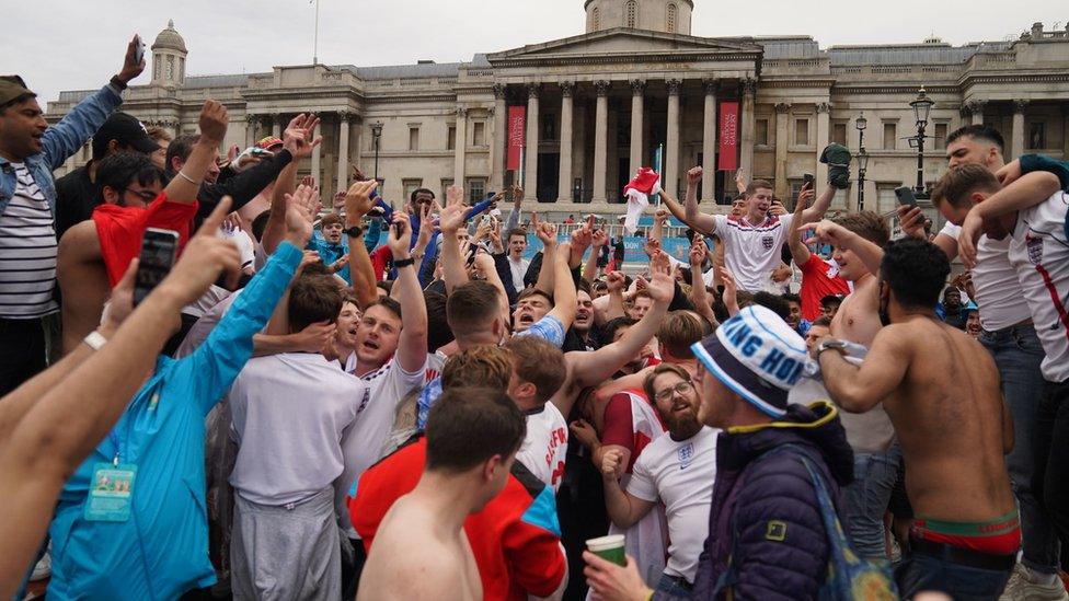 England fans celebrating the win over Germany in London's Trafalgar Square