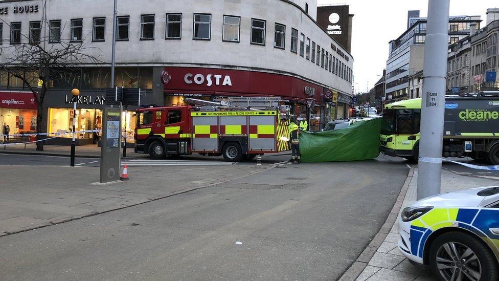 Fire engine and bin lorry block view