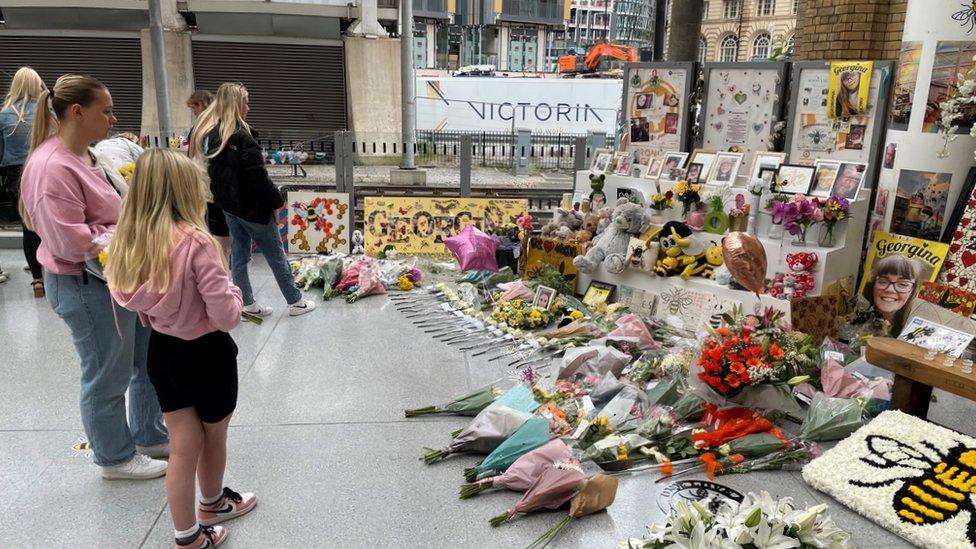 People pay tribute at Victoria Station