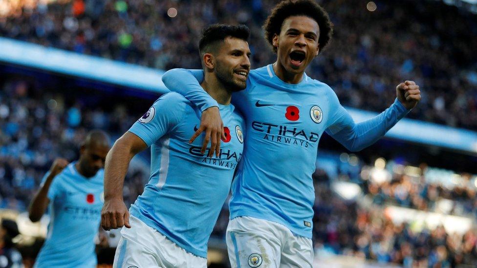 Sergio Aguero and Leroy Sane of Manchester City