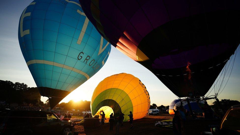 Hot air balloons preparing to take to the sky