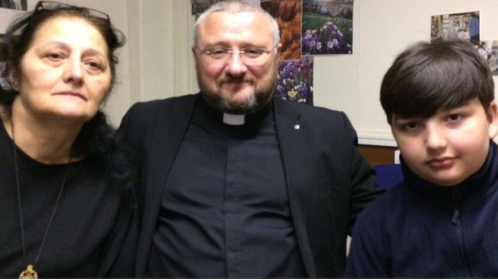 Giorgi Kakava and grandmother Katie with Rev Brian Casey