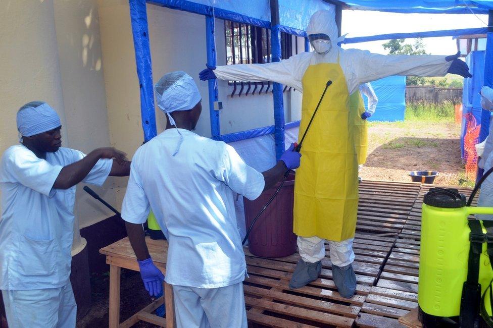 People being disinfected