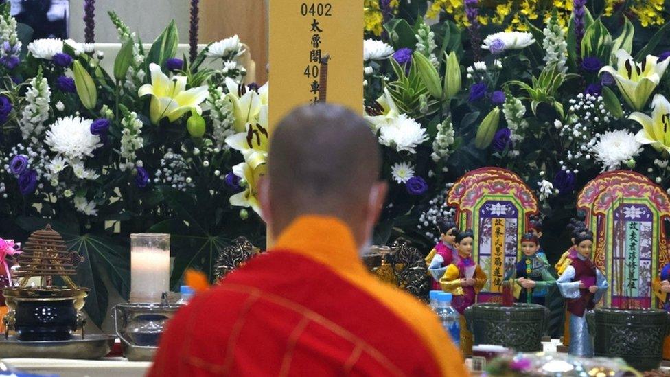 A general view during a prayer event held for victims of the deadly train derailment, at a funeral parlour in Hualien, Taiwan, April 4, 2021.