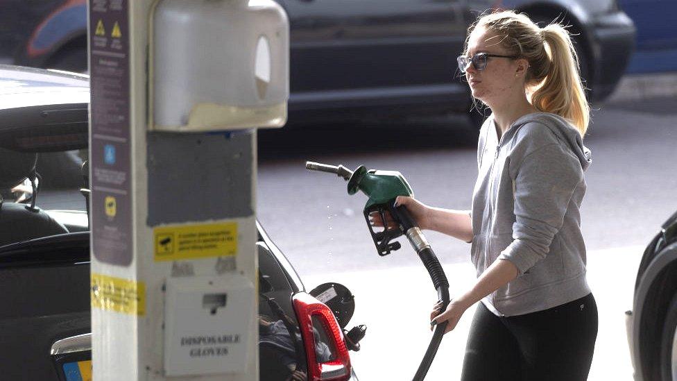 woman at petrol station