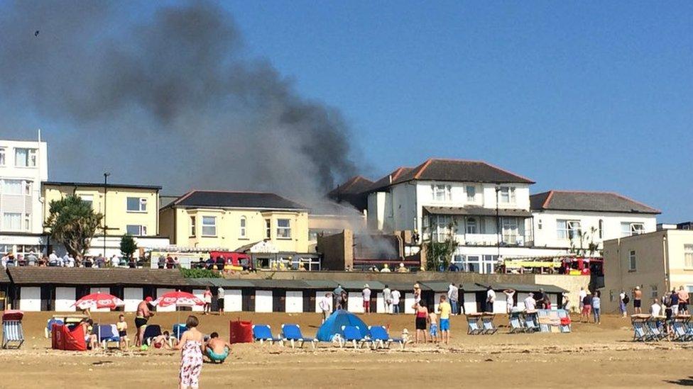 Smoke from burning buildings