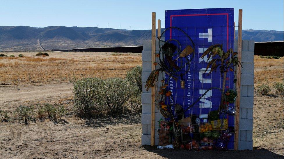 A version of Republican presidential candidate Donald Trump"s wall created by artists David Gleeson and Mary Mihelic is pictured next to the U.S. Mexican border in Jacumba Hot Springs