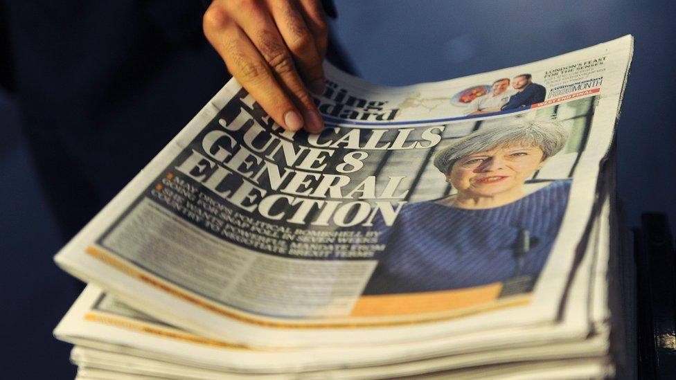 A newspaper stand shows a copy of today"s Evening Standard, with the front page story relating to British Prime Minister Theresa May"s call for a snap general election.