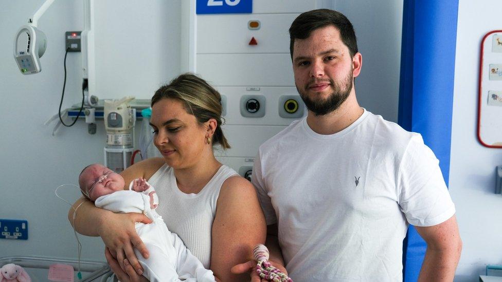 Kimberley and James Leith, with Liylah