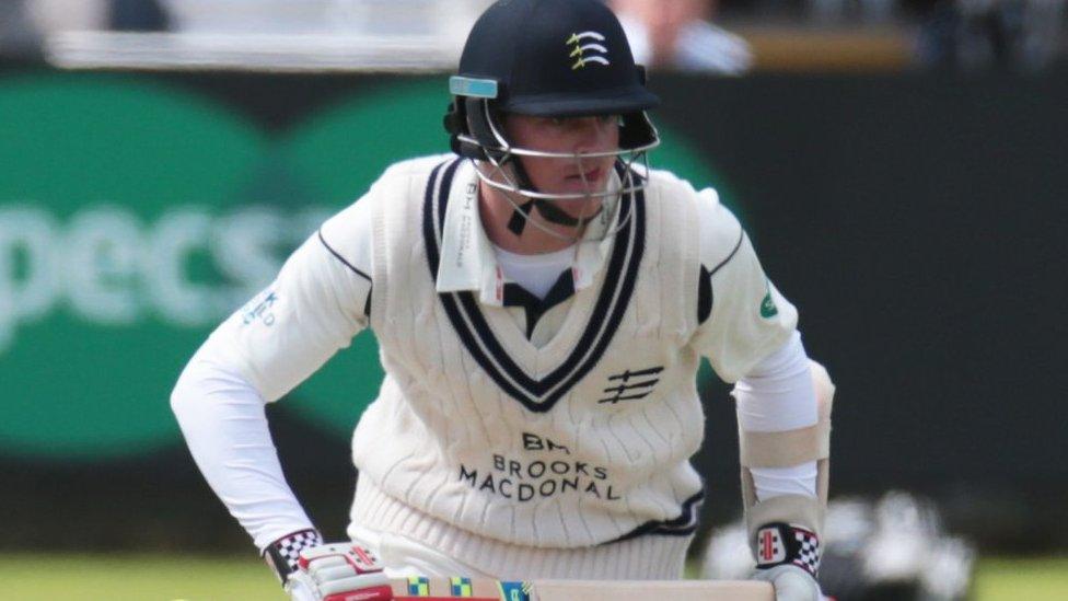 Warwickshire wicketkeeper Tim Ambrose watches as Sam Robson adds another run to his record Middlesex aggregate score