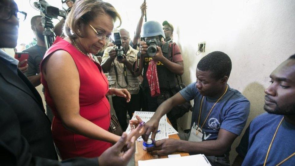 Haitian presidential candidate of Lavalas party Maryse Narcisse casts her vote at a poll station during the general elections in the country, in Port-Au-Prince, Haiti, 20 November 2016