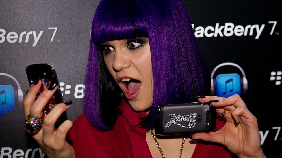 Jessie J with her Blackberry