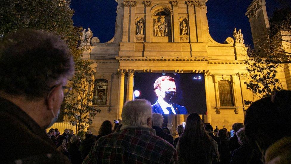 People gather on the Place de la Sorbonne during the National Tribute to the murdered school teacher Samuel Paty