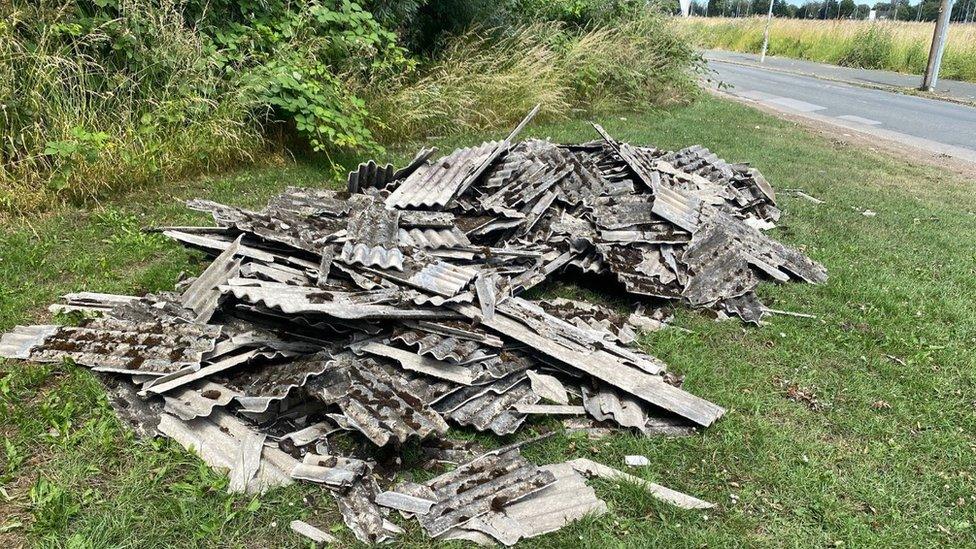 Pile of asbestos corrugated sheets