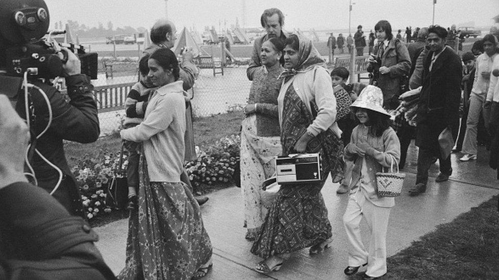 Ugandan Asian refugees arriving at Stansted Airport in Essex in 1972