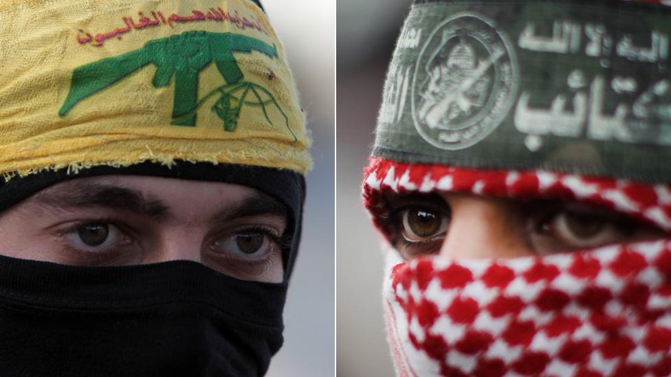 A Hezbollah fighter (left) and a Hamas fighter