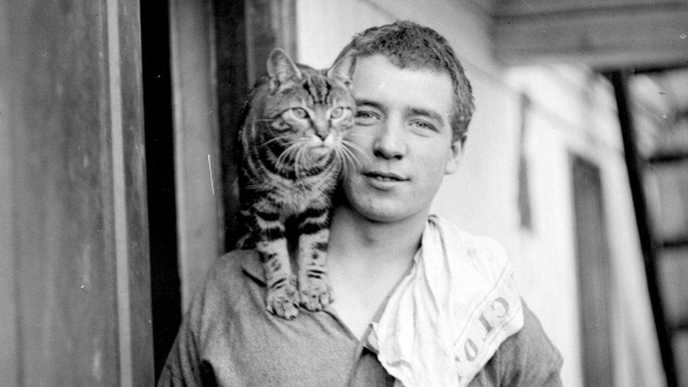 Percy Blackborow with a cat on his shoulder