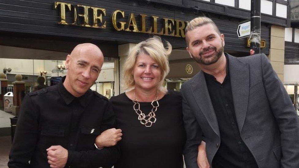 Artists Al Taylor and Al Holmes with chief executive of Wigan Council Alison McKenzie-Folan