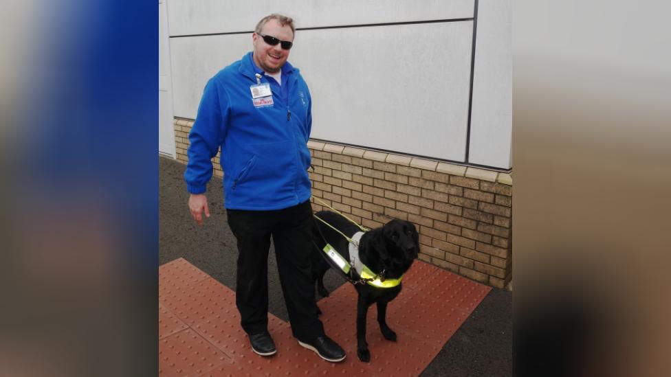 Nathan Foy and guide dog Mason