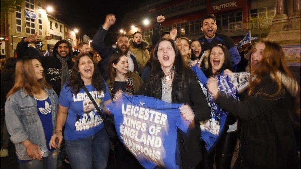 Fans in street