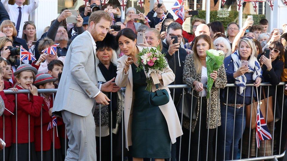 Prince Harry, Duke of Sussex and Meghan, Duchess of Sussex seen greeting crowds in Chichester during an official visit to Sussex on October 3, 2018 in Chichester, United Kingdom