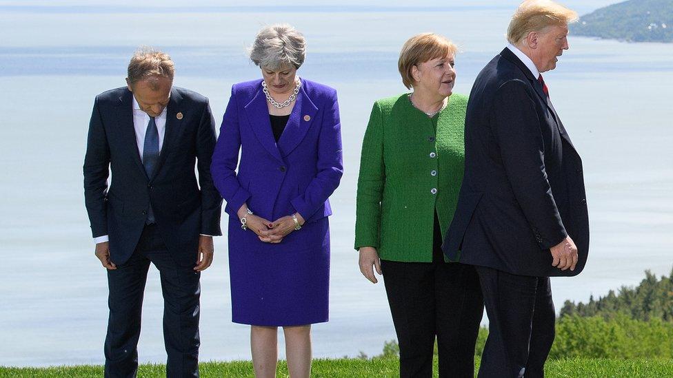 Donald Tusk, Theresa May, Angela Merkel and Donald Trump at the 2018 G7 summit in Canada