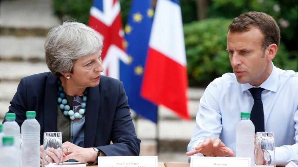 Theresa May and Emmanuel Macron at the French president's summer retreat