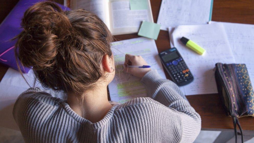 teenage girl at desk