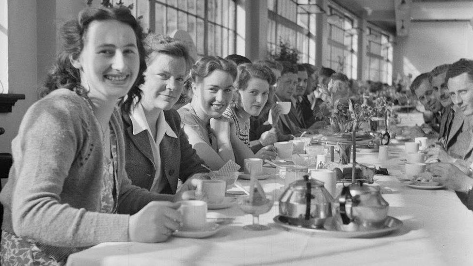 Large group having afternoon tea